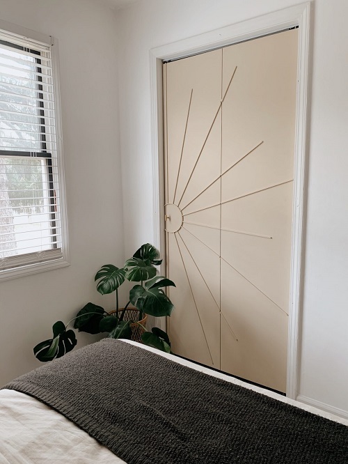 DIY sunburst bi-fold closet door DIY