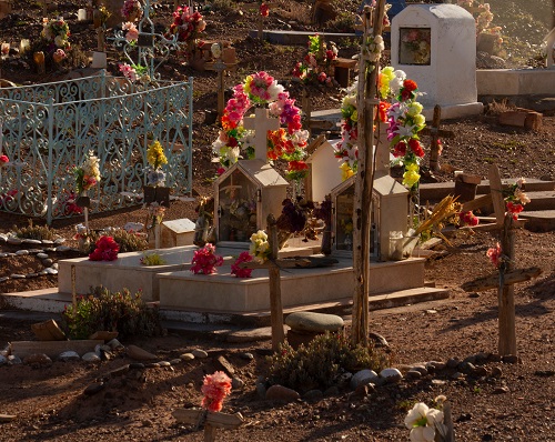 Decorate Grave With Colorful Paper Flowers