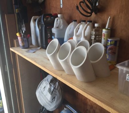 10 Spray Paint Storage Ideas Bright Stuffs PVC Spray Paint Can Under Shelf Storage 450x395