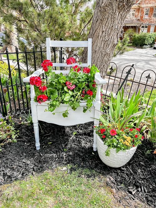 Beautiful Chair Planter in garden